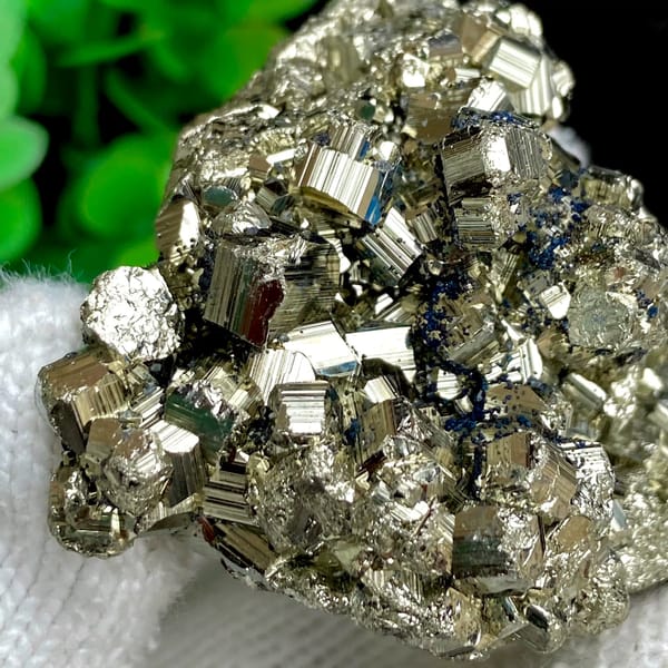 Rounded cluster of bright pyrite dodecahedra from Peru, second angle