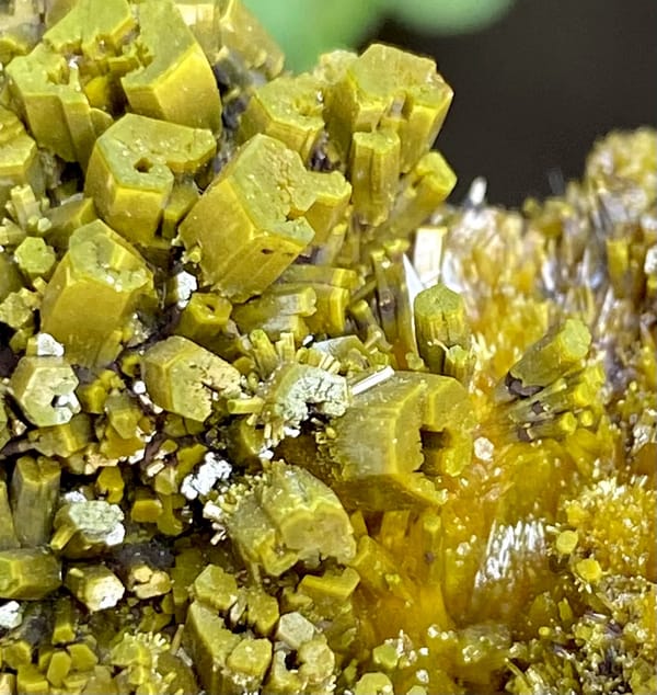 Matcha-green pyromorphite prisms covering tall wedge from Guangxi, China, close-up of the crystal faces