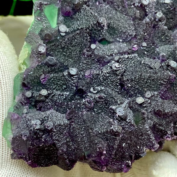 Plate of purple-edged green fluorite octahedra from Zhejiang, China, top view