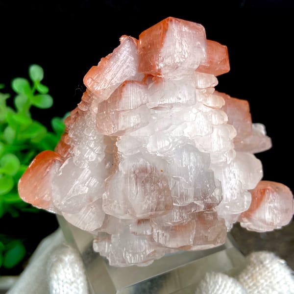 Stacked pagoda calcite with orange-red caps from Hubei, China, reverse side