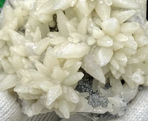 Dome of white flower-form calcite points from Guizhou, China, top view