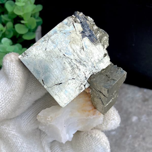 Large pale pyrite cube on pyrite base with white quartz from Shangbao, Hunan, China, close-up of terminations