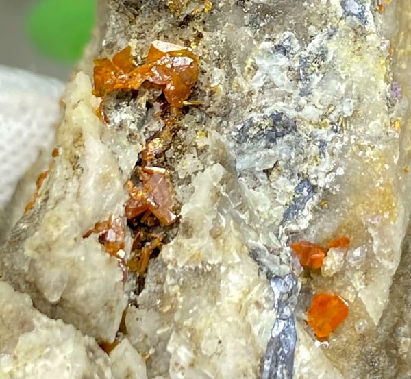 Tall white matrix wedge with orange-red wulfenite from Sichuan, China, side view