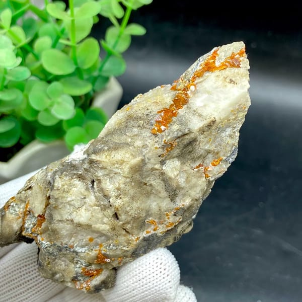 Tall white matrix wedge with orange-red wulfenite from Sichuan, China, close-up of terminations