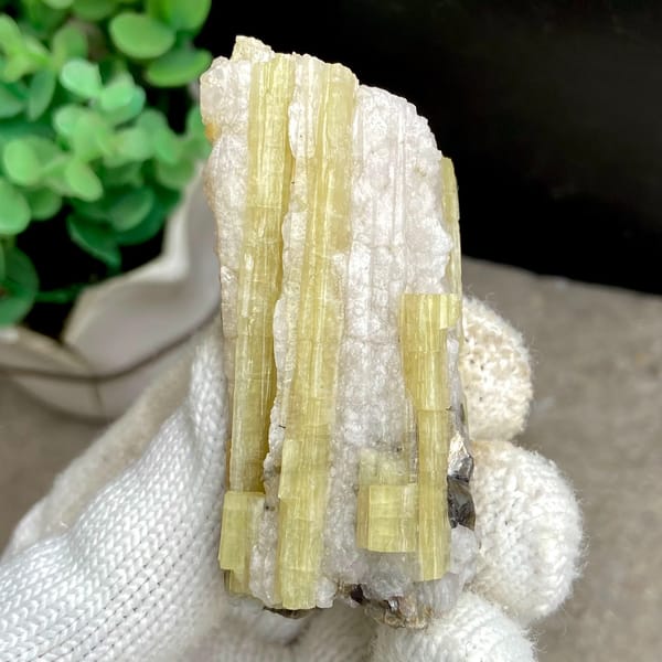Tall golden topaz column with white matrix from Germany, top view