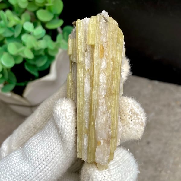 Tall golden topaz column with white matrix from Germany, overall view