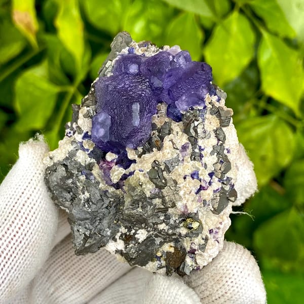Vivid purple fluorite octahedron on grey arsenopyrite from Inner Mongolia, China, second angle