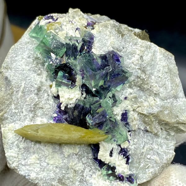 Purple-cored green fluorite cubes with yellow siderite blade from Inner Mongolia, China, close-up of terminations