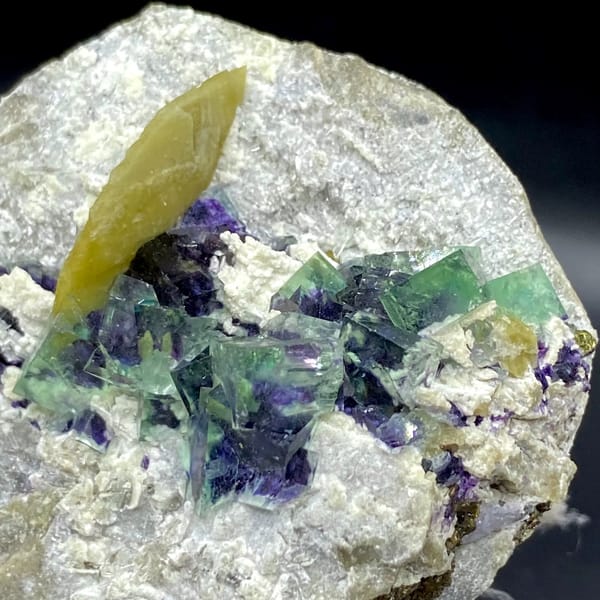 Purple-cored green fluorite cubes with yellow siderite blade from Inner Mongolia, China, overall view