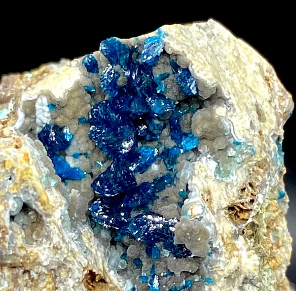 Deep blue veszelyite crystals in pale pocket from Yunnan, China, second angle