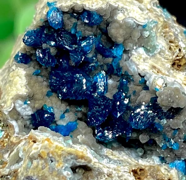Deep blue veszelyite crystals in pale pocket from Yunnan, China, top view