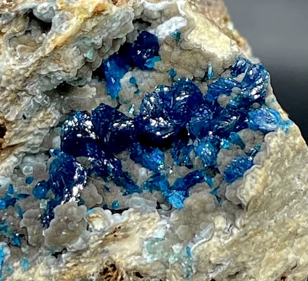 Deep blue veszelyite crystals in pale pocket from Yunnan, China, close-up of terminations
