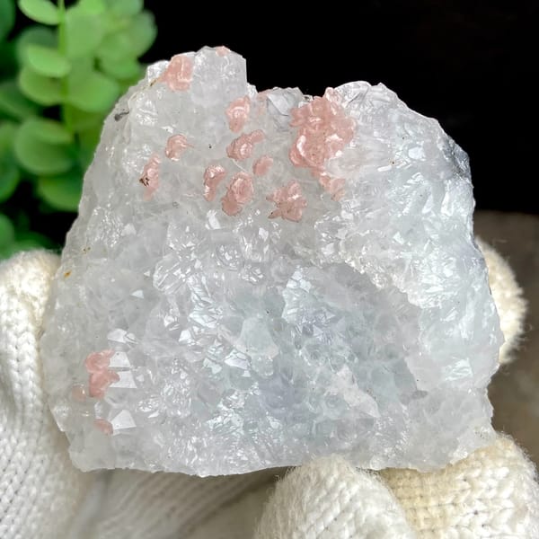 Pink rhodochrosite dots on white quartz block from Guangxi, China, second angle