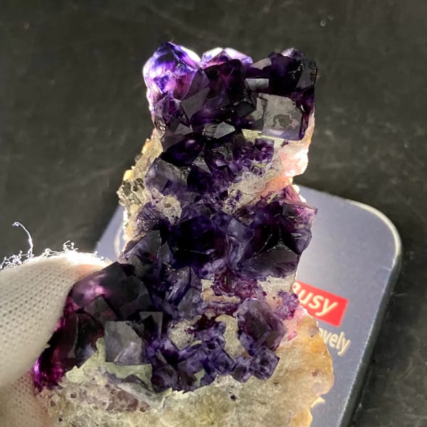 Deep purple phantom fluorite cubes on white quartz from Inner Mongolia, China, second angle