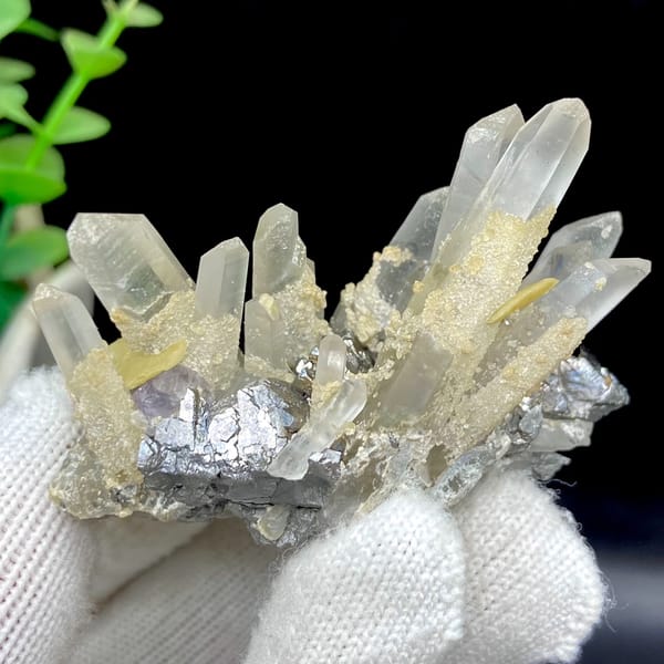 Clear quartz prisms with purple fluorite cube and siderite from Yaogangxian, Hunan, China, close-up of terminations