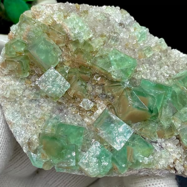 Glassy sea-green fluorite cubes on pale matrix plate from Hebei, China, reverse side