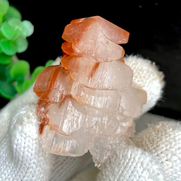 Pagoda-shaped calcite with red-capped top from Hubei, China, reverse side