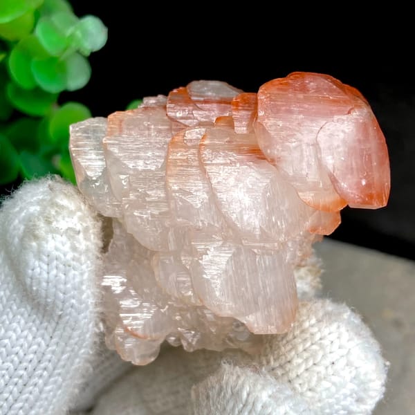 Pagoda-shaped calcite with red-capped top from Hubei, China, side view