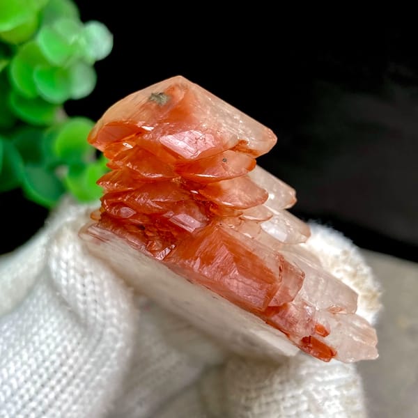 Pagoda-shaped calcite with red-capped top from Hubei, China, close-up of terminations