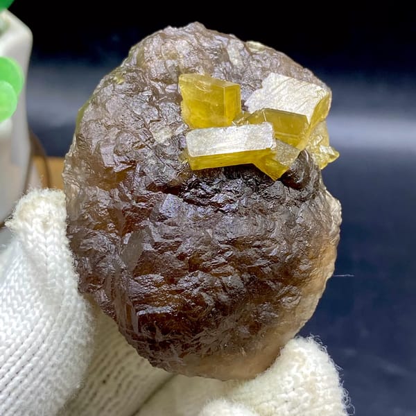 Golden baryte blades on smooth brown fluorite ball from Jiangxi, China, second angle