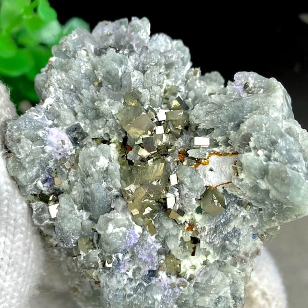 Brassy pyrite cubes on pale green quartz from Shangbao, Hunan, China, top view