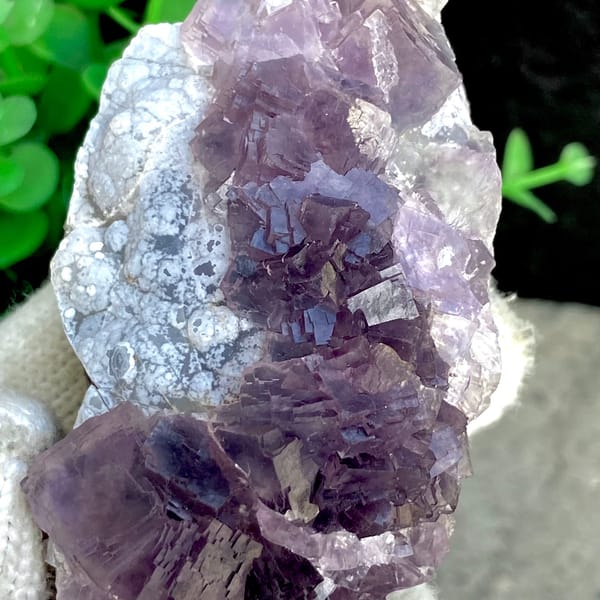 Tall purple fluorite with green cores from Zhejiang, China, detail of the matrix contact