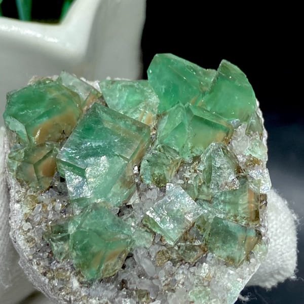 Transparent green fluorite cubes on sparkling quartz from Hebei, China, overall view
