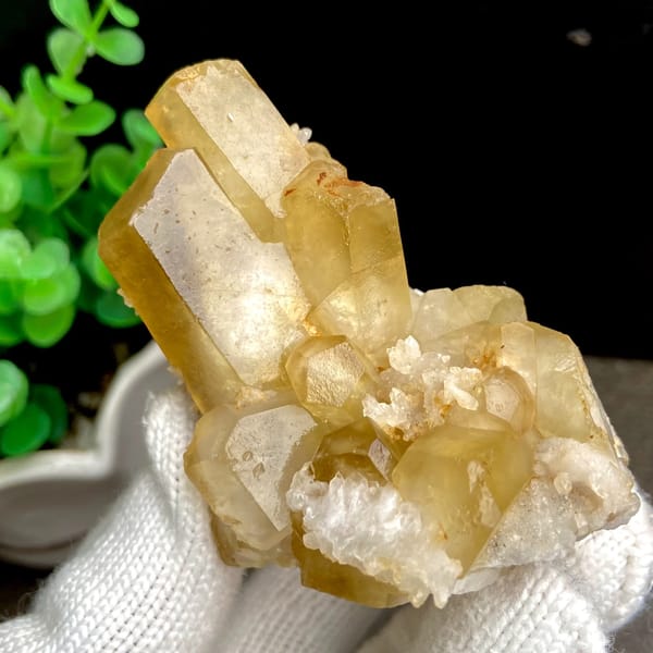 Honey-yellow hexagonal calcite prisms with quartz from Shangbao, Hunan, China, top view