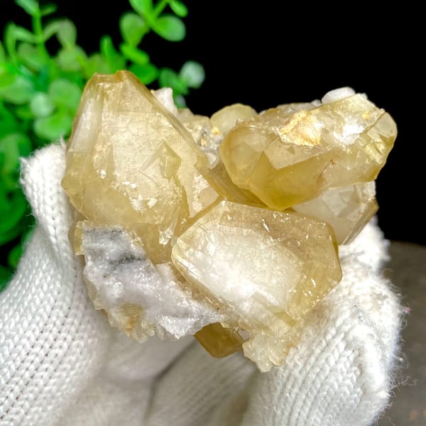 Honey-yellow hexagonal calcite prisms with quartz from Shangbao, Hunan, China, side view