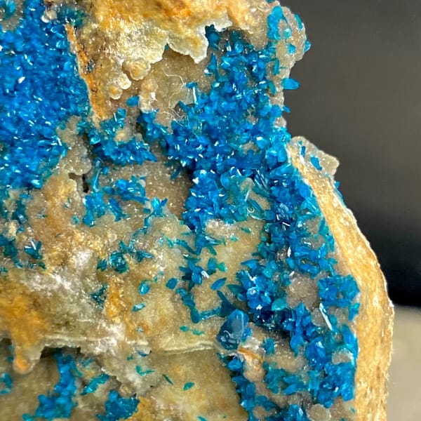 Tall plate of blue-green veszelyite crystals from Yunnan, China, reverse side