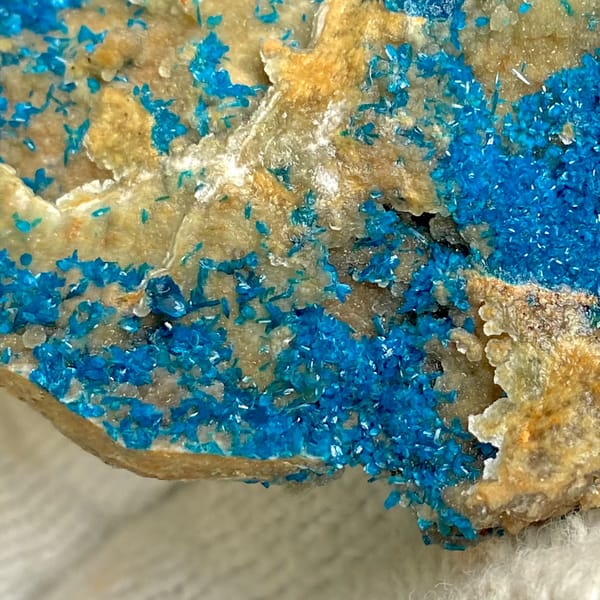 Tall plate of blue-green veszelyite crystals from Yunnan, China, side view