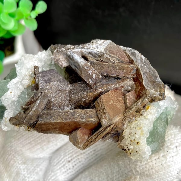 Brown bladed calcite with green fluorite and quartz from Fujian, China, detail of the matrix contact