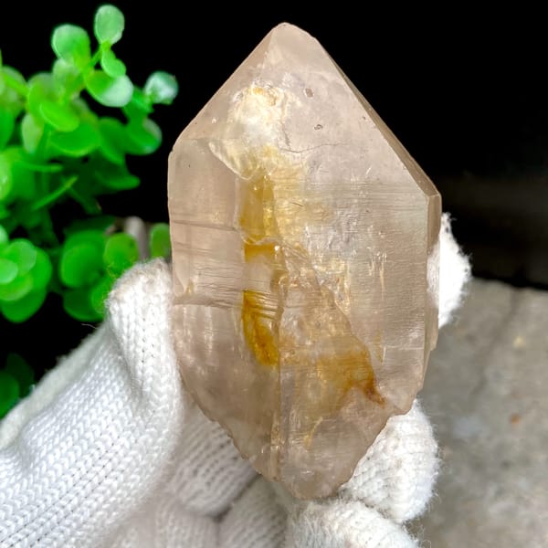Transparent single quartz crystal with golden phantom from Sichuan, China, second angle