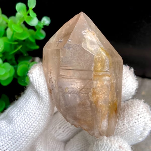 Transparent single quartz crystal with golden phantom from Sichuan, China, reverse side