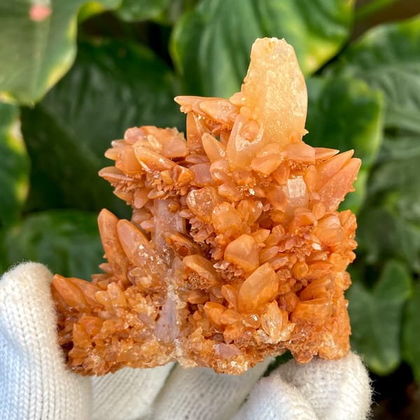 Orange calcite cluster of stacked pointed crystals from Yunnan, China, second angle
