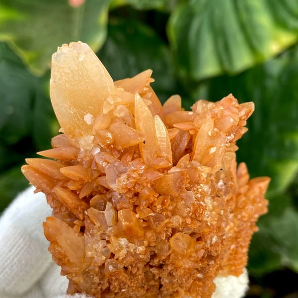 Orange calcite cluster of stacked pointed crystals from Yunnan, China, top view