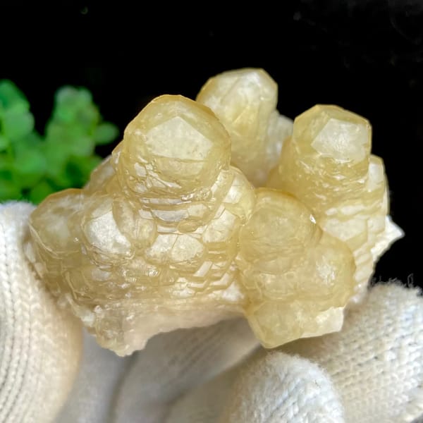 Honey-yellow stepped calcite columns in rounded group from Guizhou, China, overall view