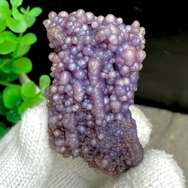 Tall cluster of purple grape agate balls from Indonesia, second angle