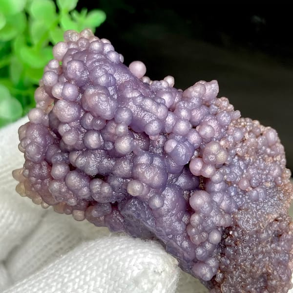 Tall cluster of purple grape agate balls from Indonesia, top view