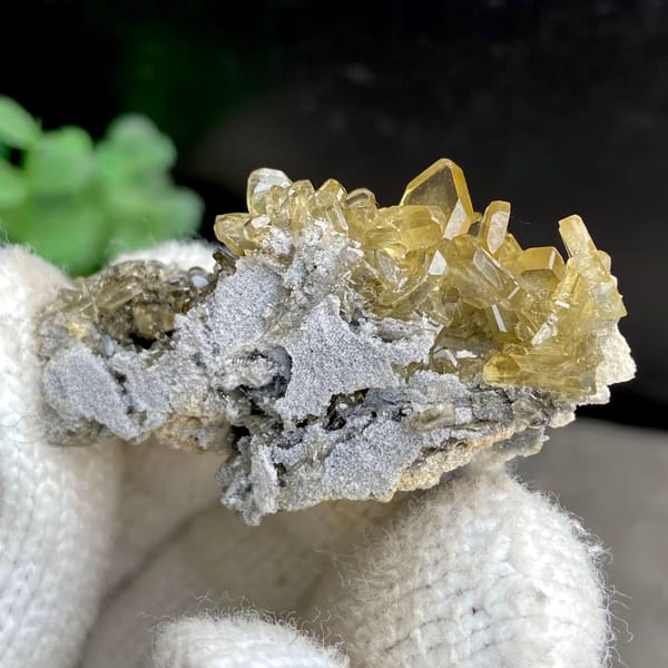 Golden transparent baryte blades on grey matrix from Yunnan, China, reverse side