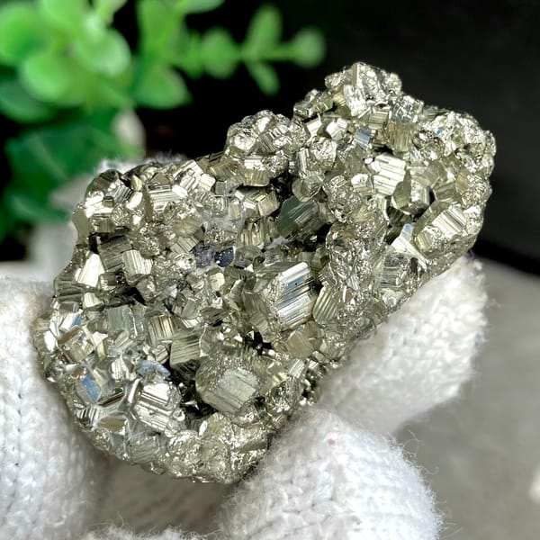 Pyrite cube cluster with black marmatite from Peru, detail of the matrix contact