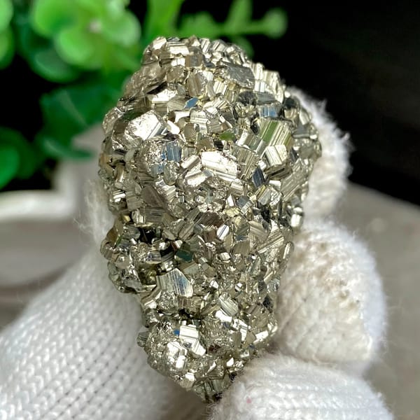 Pyrite cube cluster with black marmatite from Peru, side view