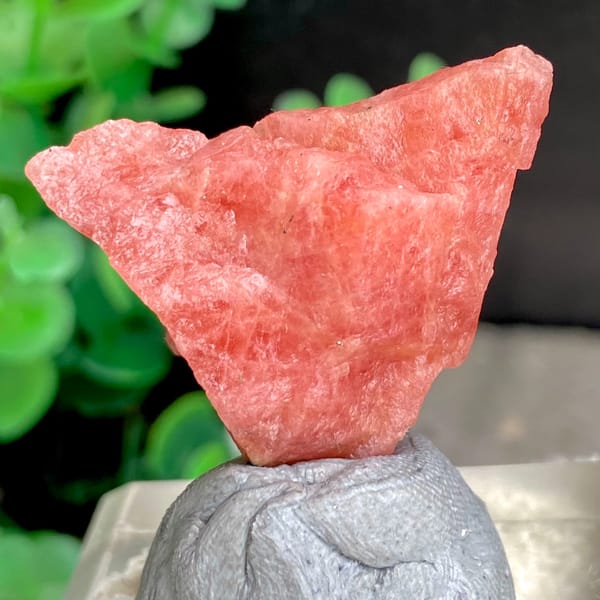 Salmon-pink rhodochrosite nugget from Wuzhou, Guangxi, China, reverse side