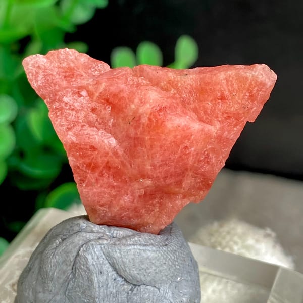 Salmon-pink rhodochrosite nugget from Wuzhou, Guangxi, China, top view