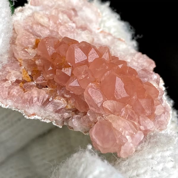Pale pink quartz pocket with tiny rose-tinted crystals from Argentina, top view