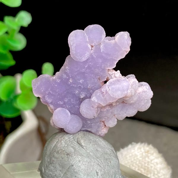 Lavender grape agate spray with pearly lustre from Indonesia, reverse side