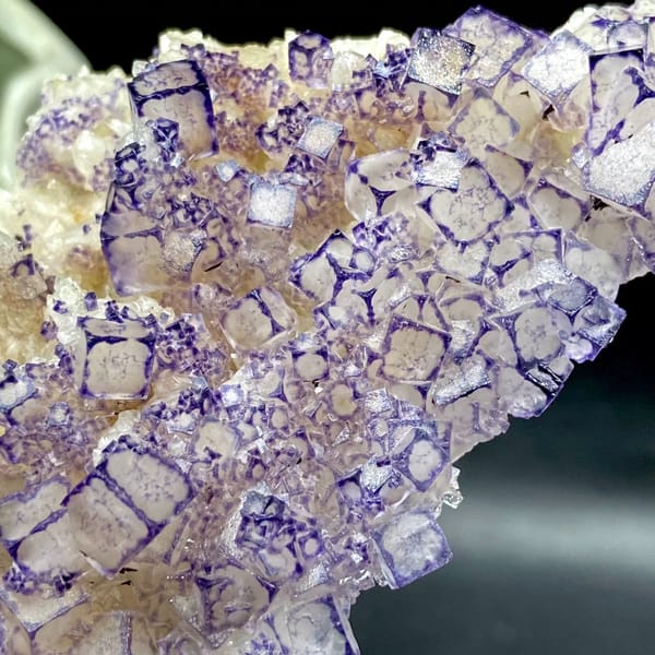 Guizhou fluorite plate with pale cubes outlined in deep purple — alternate view