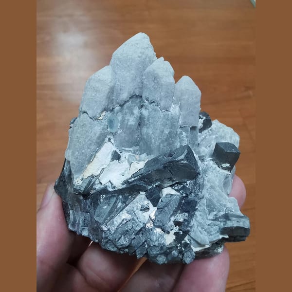 Grey quartz candle crystal cluster with arsenopyrite and fluorite, natural mineral specimen, photo 1 of 8