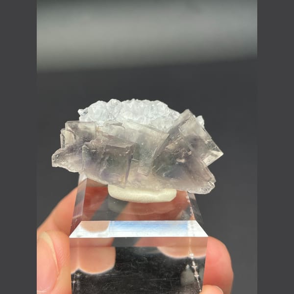 Translucent pale fluorite with frosted top and blue heart from Zhejiang — complete view
