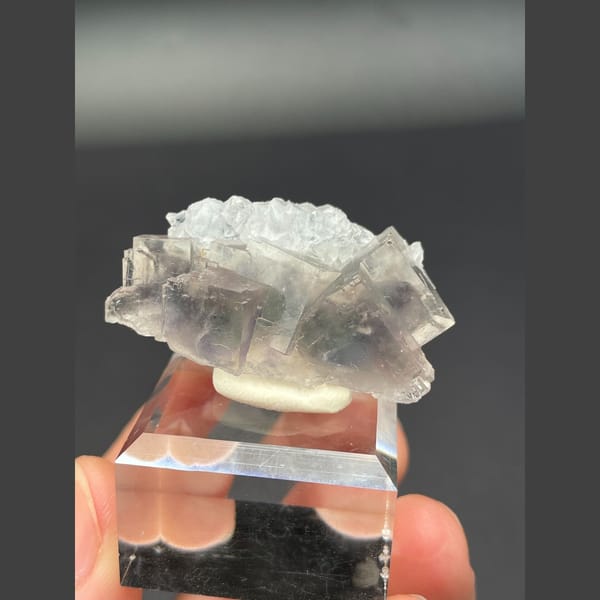 Translucent pale fluorite with frosted top and blue heart from Zhejiang — alternate view